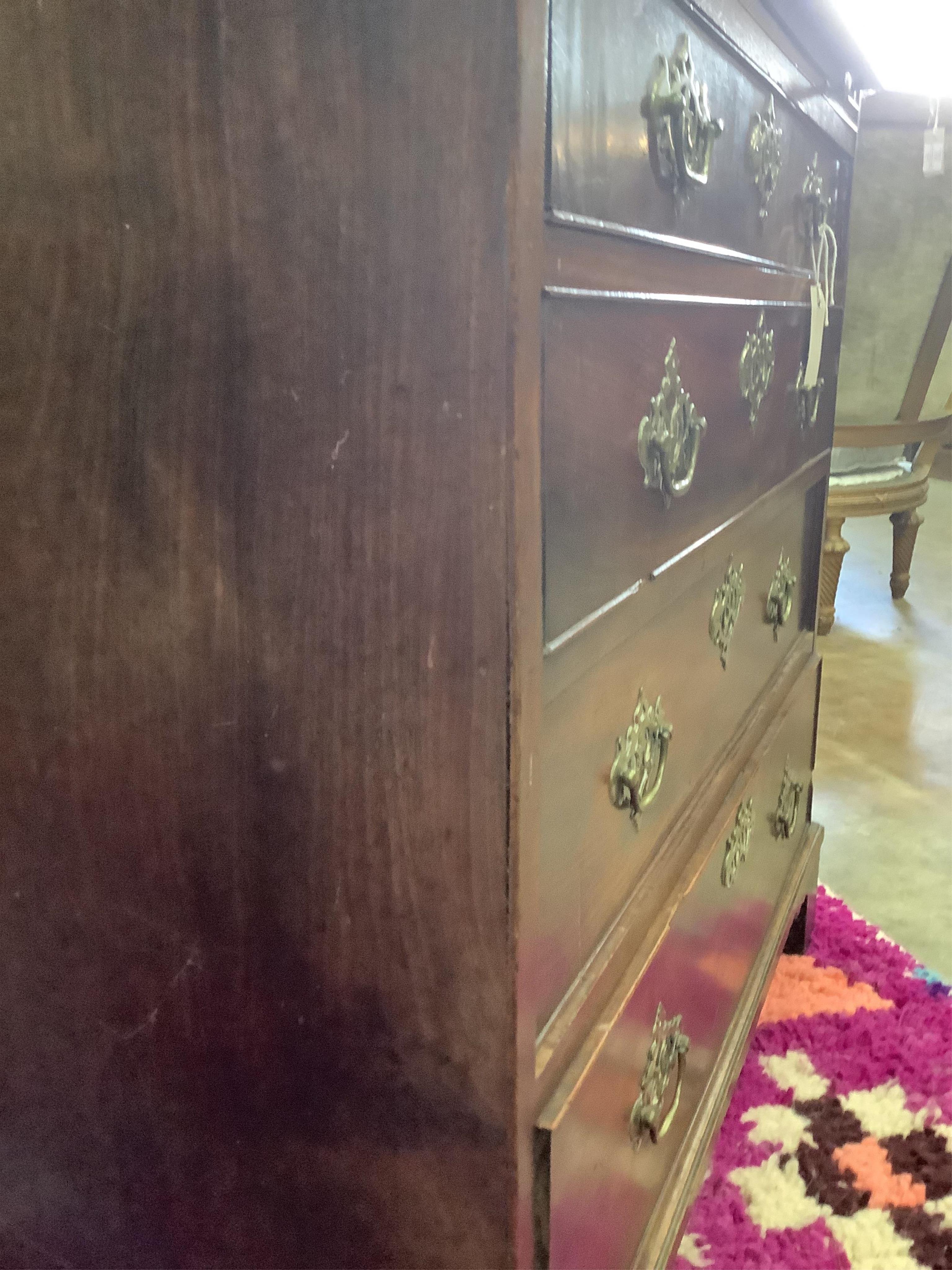 A small George III mahogany chest, fitted four long drawers, beneath a brushing slide, width 80cm, depth 49cm, height 81cm. Condition - fair